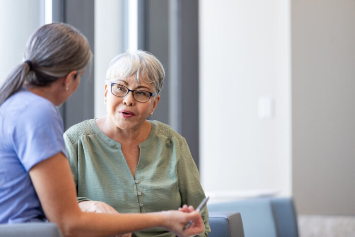 Woman talking to doctor about diaper cream